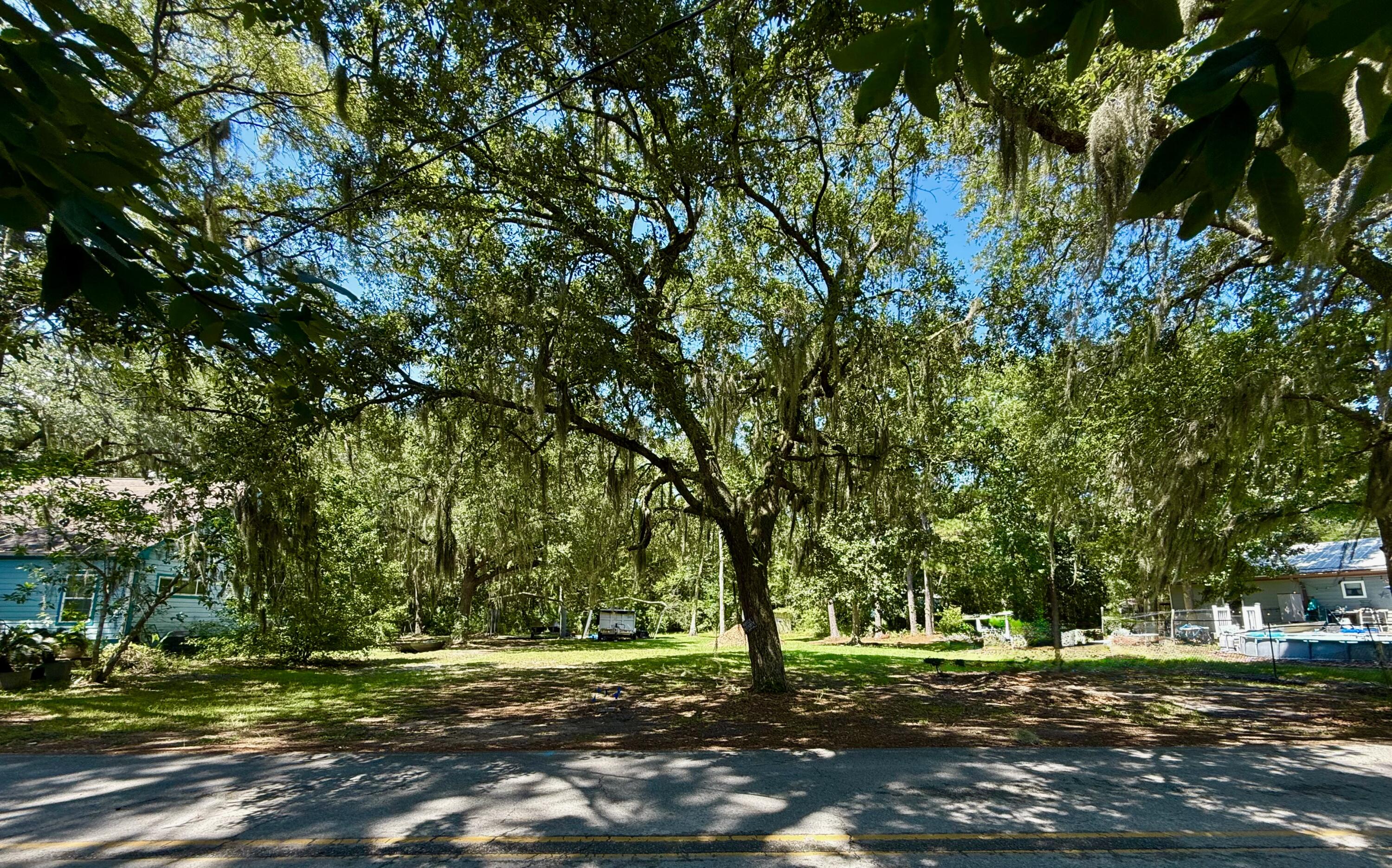 A Bay View Retreat Waiting to Be DiscoveredTucked away on a quiet road shaded by towering live oaks, this cleared lot offers more than just land--it offers a way of life. From your future front porch, you'll gaze out across the tranquil waters of Jolly Bay, where every sunrise dances on the ripples and every sunset paints the sky in soft golds and fiery reds.Just steps away, the bay invites you to slow down and savor the moment. Launch your kayak for a peaceful paddle through still waters, cast a fishing line from the shore, or simply sit with your toes in the sand and watch the tide roll in. The community's rare bay access, right across the street, is your gateway to quiet mornings and starlit evenings on the water. This lot has the water tap paid and in. Sewer avail. through City Here, nature sets the pace, but you're never far from the conveniences of life. Just minutes away, the City of Freeport offers small-town charm, while the white sand beaches of 30A and the vibrant energy of the Emerald Coast are only a short drive from your doorstep.
No HOA. No flood insurance required. Utilities at the road. All that's missing is your vision for a custom home or investment retreat that embraces the rhythm of bay life.
This isn't just property...it's a place where the water calls, the trees whisper, and life moves with the gentle flow of the tides.
***All dimensions shown in listings, plat and/or photos are approximate only. Buyer will be responsible to complete due diligence to ensure accuracy of all information.