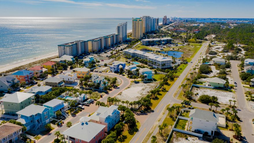 LOT HAS BEACH MOUSE PERMIT! BEAUTIFUL, CUSTOM BEACH HOME DESIGNS AVAILABLE - SEND REQUEST. Private, gated neighborhood offers community pool or the beautiful Gulf of Mexico - take your pick! Come see the only gated gulf front housing area on Perdido Key with over 1000' of beachfront for the homeowners of Parasol. Ideally situated off of Johnsons Beach Road - quaint and quiet and less than 1/8 mile to the entrance of the National Seashore. Beach mouse permit in hand & ready for building!