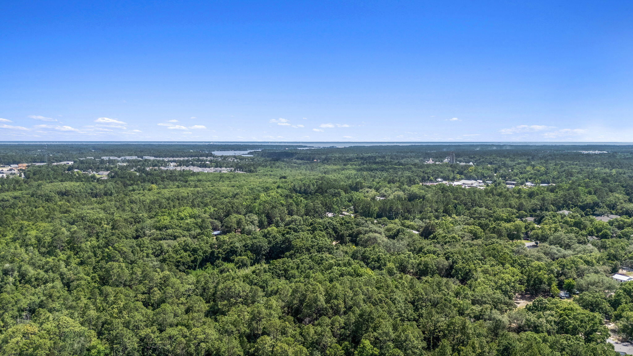 2.5 commercial acres in the City Limits of Freeport. Business or residential or mixed, you decide. Flood Zone X. Easement gives access from N. Jackson St. via Pecan Dr.
