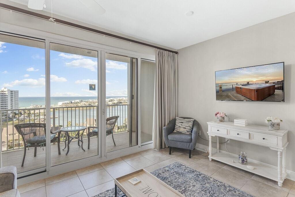 Vacation in style in this amazing 1 bedroom condo. With 10th floor views of the Gulf of Mexico, lagoons, and Ariel Dune's pools you'll enjoy breathtaking sunsets and relaxing on your private balcony. This freshly renovated condo features a fully equipped kitchen, open living space with new decor and furnishings, hallway bunk beds, and a full bathroom with washer and dryer. This unit also has a brand new AC system! Seascape offers access to the worlds most beautiful beaches, entertainment, restaurants, world class golf, tennis, and more. All right on property! Come see this pristine condo today.