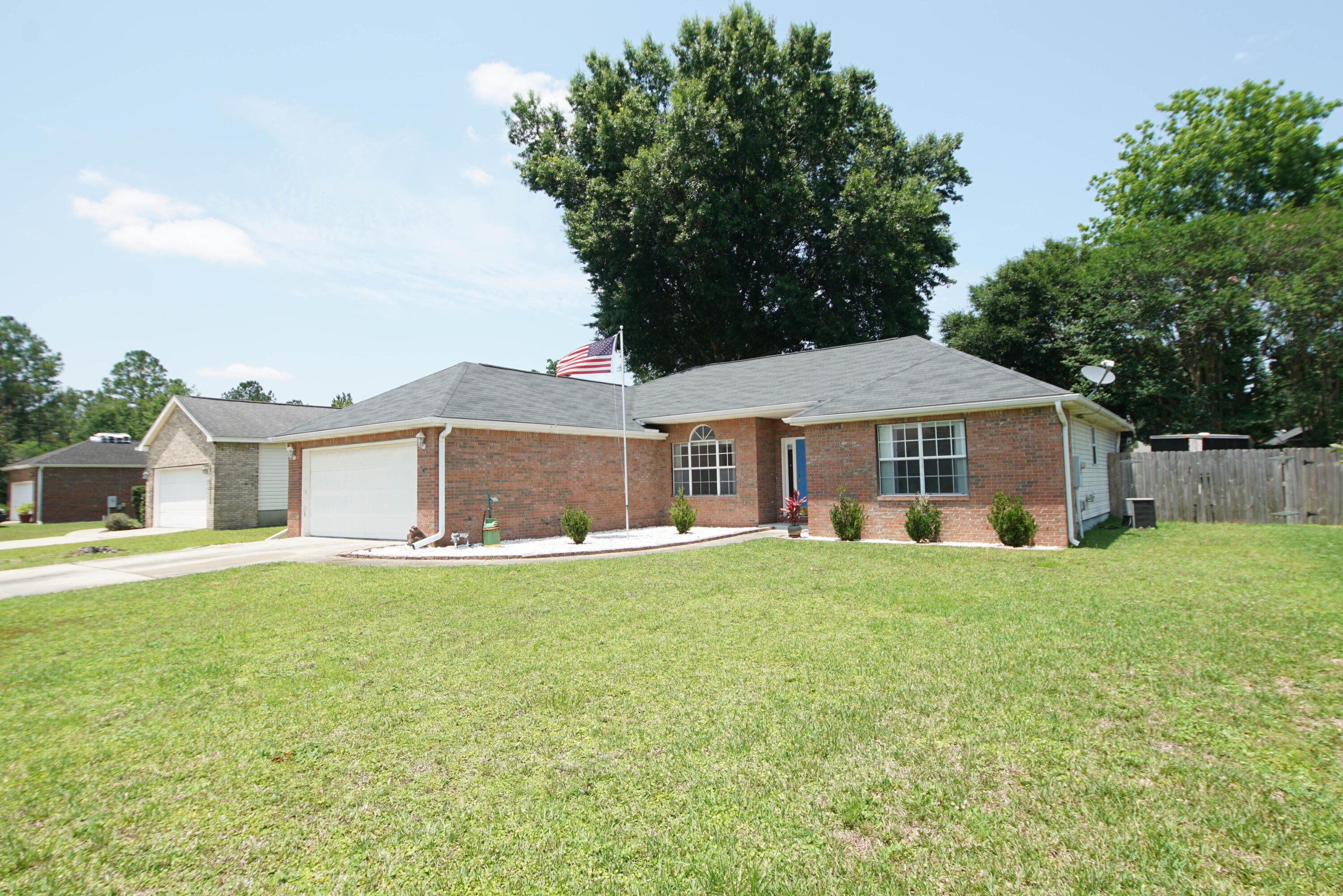 Great Curb Appeal on this Brick Front Home South of I-10. Convenient Eglin Air Force Base, Duke Field and 7th Special Forces. Spacious living in this over 1700 sq ft home with Formal Dining Room, Eat-In Kitchen and Living Room with Fireplace. Split Bedroom plan adds privacy. Great Primary/ Owners Suite and Walk-In Closet. Wonderful Covered Back Patio that stretches almost the length of the house increases your living area. Beautiful Privacy Fenced Back Yard with Fire Pit and Shade Tree. Inside Laundry. 2 Car Garage and plenty of Driveway Parking. Call to see!!Buyer to verify all measurements and pertinent information.