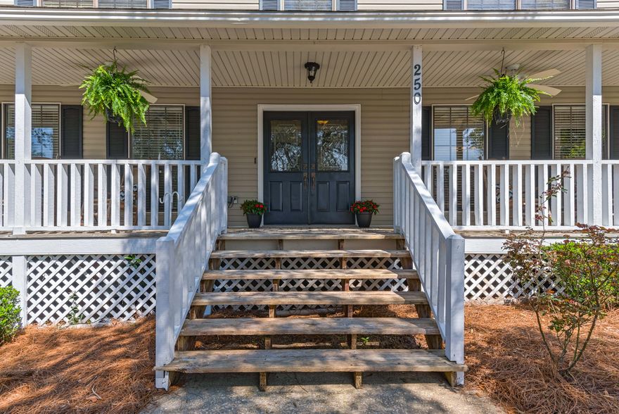 Incredible Value. Excellent location. Traditional Two-Story Home with 4 bedroom 2.5 bath plus office is a delight with a front porch worthy of Coast Living Magazine. Located on a large corner lot in the sought after, tranquil community of Bluewater Bay with NO HOA fees. Enter through the double doors into the foyer that leads to an inviting great room with gorgeous wood burning fireplace. Spacious kitchen with breakfast nook and 1/2 bathroom. Enclosed sunroom is perfect spot to read a book or walk outside through the French door onto the wood plank deck. All bedrooms are generous in size with closets and ceiling fans located on the second floor. The exterior features include 6-ft privacy fenced around the backyard, giant side yard perfect for pool, 2-garage and special handy workshop