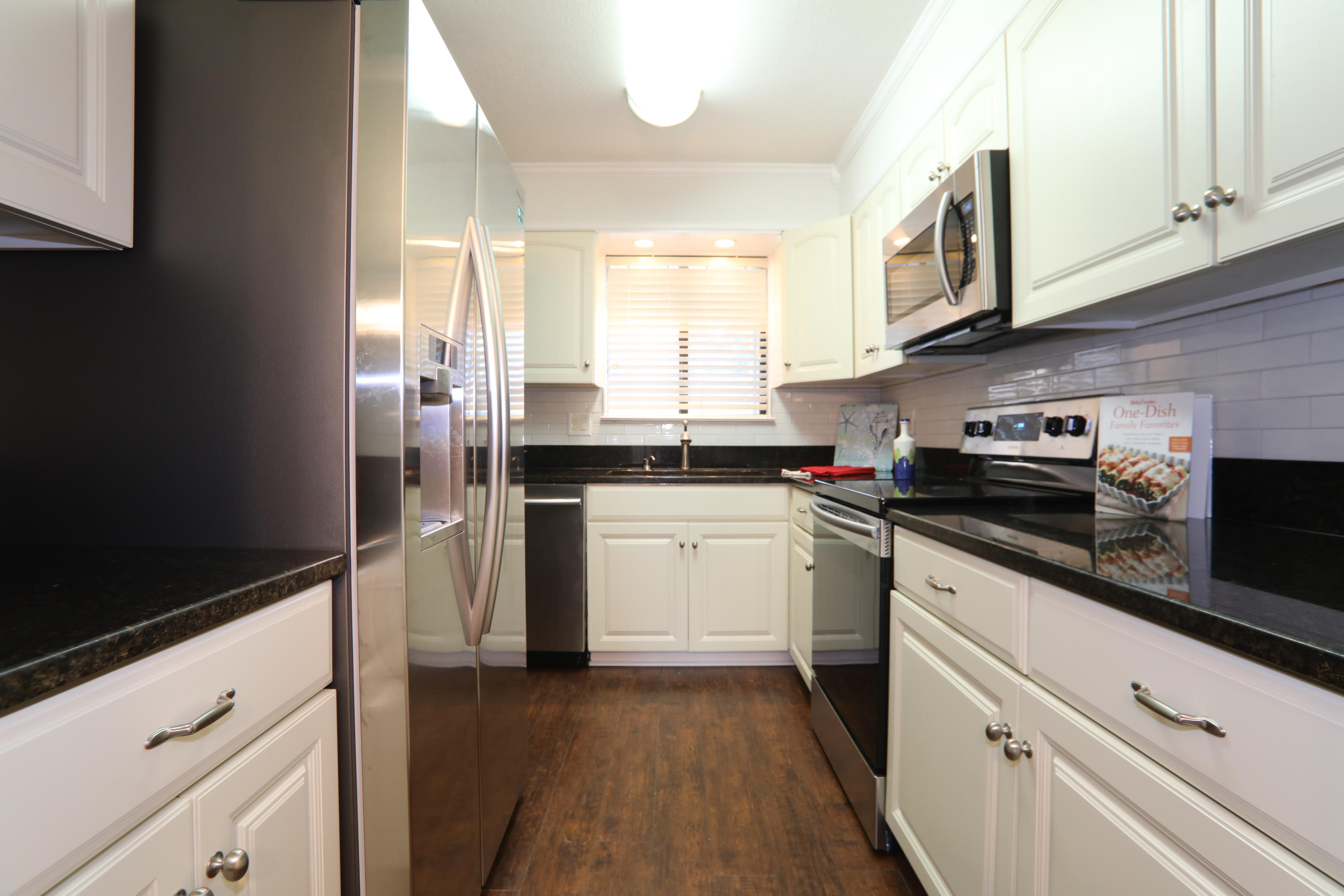 Cute and completely remodeled townhome that is centrally located, has no HOA fees, and is priced to sell! This townhome features an updated kitchen with granite and stainless steel appliances, new laminate hardwood flooring, new ceiling fans, and light fixtures. There is a half bathroom on the first floor, two bedrooms on the second floor, and a full bathroom on the second floor. Another great feature of this home includes an enclosed porch with AC and heat, as well as an open deck that would be perfect to grill on. This home is conveniently located just minutes from Fort Walton Beach Medical Center and Northwest Florida State College.