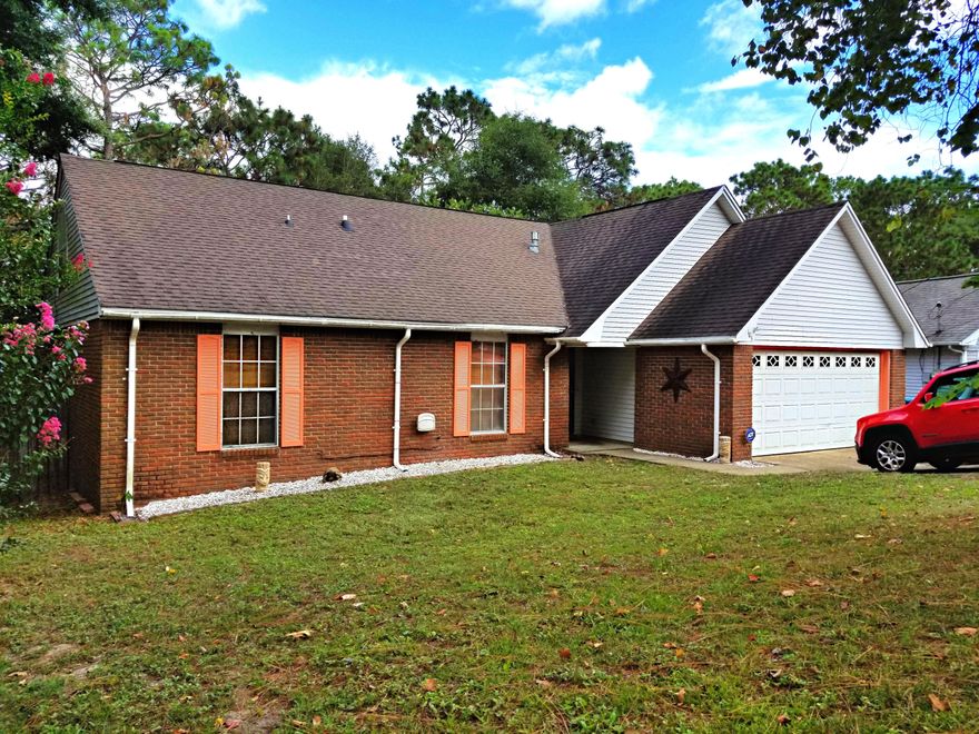 Home Sweet Home South of I-10 w/Seller Incentives of $6,950! Seller paying Buyer's Closing Costs up to $4,500 + Paint Allowance up to $1,000 + Flooring Allowance up to $1,000 + a Home Warranty up to $450! This 4 bed/3 bath home is waiting for you. Brand New AC, Gas Furnace, & Gas Hot Water Heater put in 2018. Updated kitchen w/new countertops, center island, Gas stove, & pantry. Tiled Living room w/Gas fireplace & vaulted ceilings. Master suite downstairs w/crown molding, walk-in closet, double vanities, & French doors leading to large open deck w/extra underneath storage. Two additional bedrooms downstairs w/Walk-in closets. 4th bedroom or 2nd Master suite is upstairs w/its own private bathroom & closet. Screened in Porch overlooks fenced backyard & King Branch! Oversized 2 car garage w