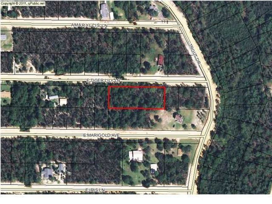 4 lots in a group... almost 1 acre, somewhat private, wooded. Great location for mobile home or a new home to be built.