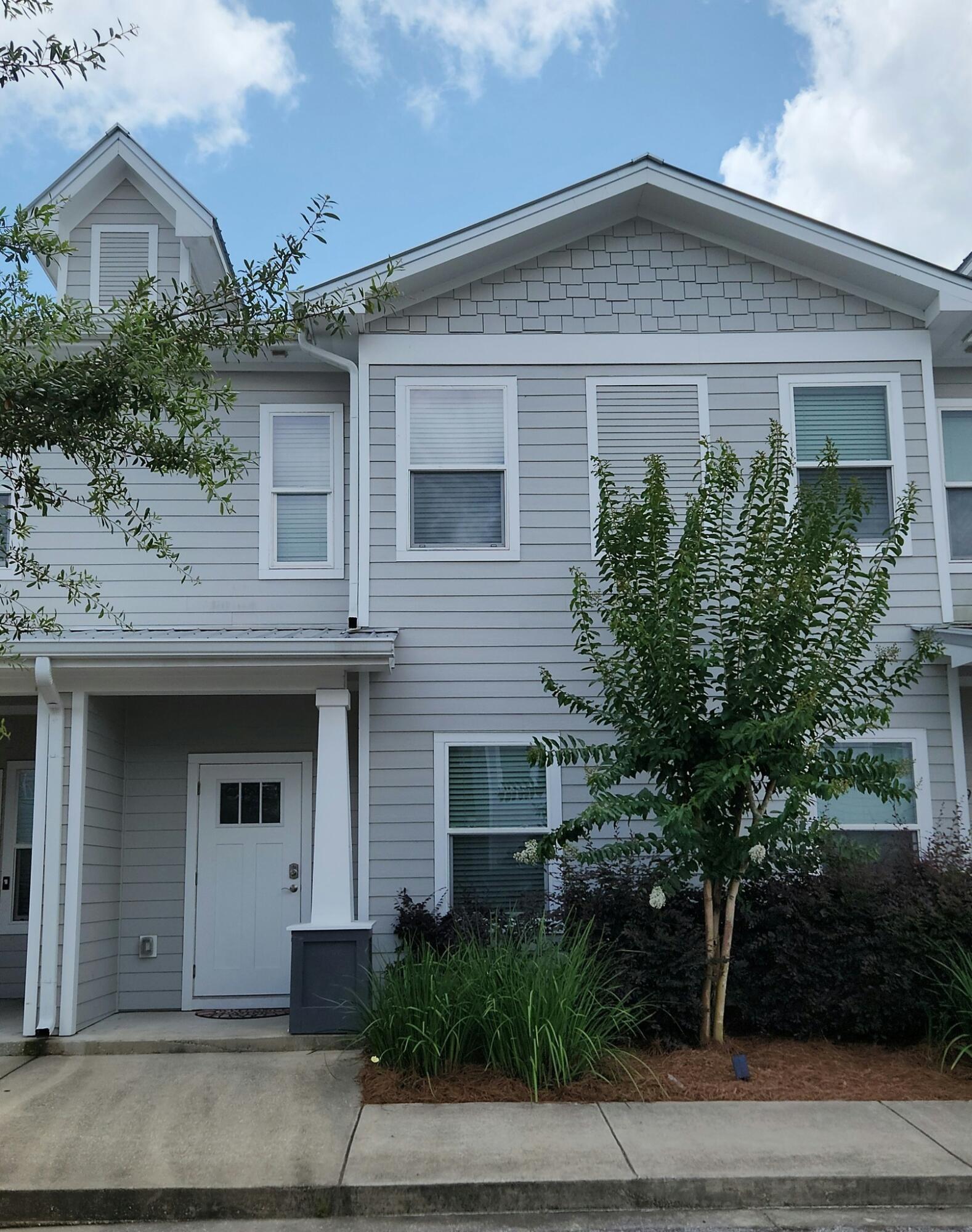 Discover your dream townhome in Verandas of Freeport! This stylish 3BR/2.5BA boasts luxurious finishes including Quartz countertops, stainless steel appliances, and sleek Luxury Vinyl Plank flooring. Enjoy an open floor plan, a screened back porch perfect for relaxing, and a friendly community with a playground, pool, basketball, and tennis courts--all just a short drive to the beautiful beaches. Your perfect coastal lifestyle starts here!