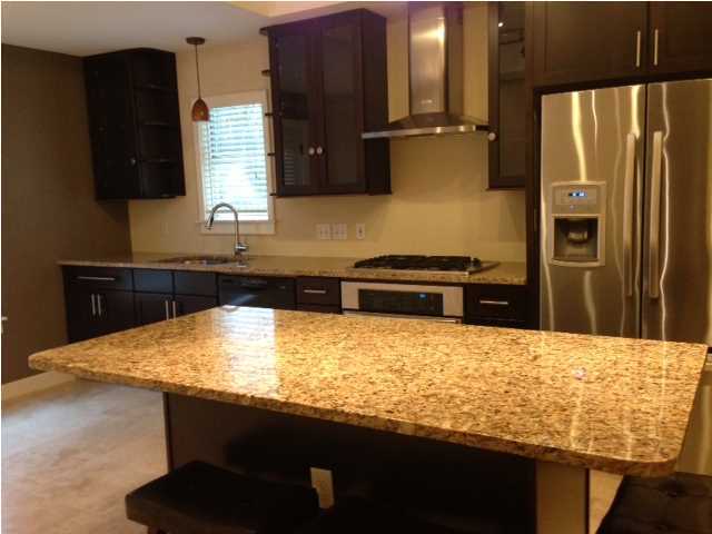 Don't miss this two bed room two bath home in the heart of Destin. This is a lot of house for the money and is immaculate! Close to BEACH...You will enjoy the master suite with a walk in closet and whirlpool tub. Open living room with fireplace book shelves. Kitchen includes stain less appliances with gas stove, granite counter tops, another wet bar off the kitchen for entertaining. All travertine flooring throughout the house. Large back yard with awesome deck. One car garage..... This home has many up grades.