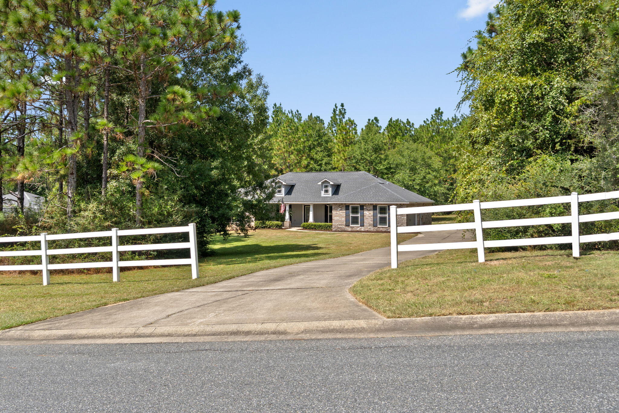 Welcome to this beautiful 4-bedroom, 2-bath home on 1.06 acres, perfectly positioned at the end of a cul-de-sac in Yellow River Plantation. This property offers a spacious layout and a peaceful setting you'll love coming home to.Inside, soaring cathedral ceilings create an airy and open feel. The kitchen is a standout with granite countertops throughout, stainless steel appliances, a center island, and a breakfast bar that flows into the living area.The bonus room is a versatile feature that can serve as a home office, playroom, media room, or gym, giving you space to customize to your needs.The oversized primary suite includes a tray ceiling, dual walk-in closets, and an en suite bath with a soaking tub, separate shower, and dual vanities. The split-bedroom floor plan keeps the additional three bedrooms and full bath on the opposite side of the home, offering added privacy.
Other highlights include brand-new carpet in all bedrooms, a professionally cleaned interior, and a large laundry room with custom shelving. Step outside to enjoy the expansive yard, perfect for outdoor activities, entertaining, or simply relaxing in a cul-de-sac setting.