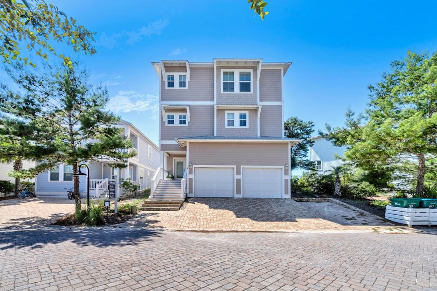 This custom-built beach house sits on a high ridge at one of the highest points in Highlands Parks and is one of the largest homes in the neighborhood. From its lofty location, it enjoys views across Blue Mountain Beach to the shimmering Gulf of Mexico. Designed for large gatherings, it's an entertainer's dream with 3800 square feet of well-planned living space spread over three levels. A paved driveway provides parking and access to a two-car garage with steps to the welcoming entrance porch. The first floor has a versatile bonus/game room with bunk recess and a full bathroom. A door leads to a covered porch with access to the rear yard. The open-concept living space takes up the entire second floor and includes built-ins flanking a cozy fireplace.