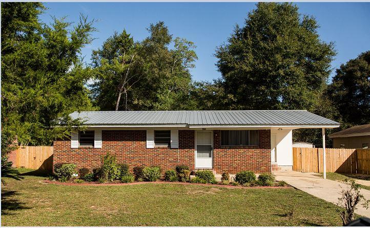 This house has recently under gone work with the HVAC blower etc. also metal roof is 3 years new! All original hard wood floors throughout. Renovated bathrooms with beautiful tile work. Features a one car carport attached to the house, privacy fenced in back yard for the animal lovers. Has a concrete back patio with a shed for lawn equipment storage out of the elements. Also copper has been installed instead of the original aluminum.