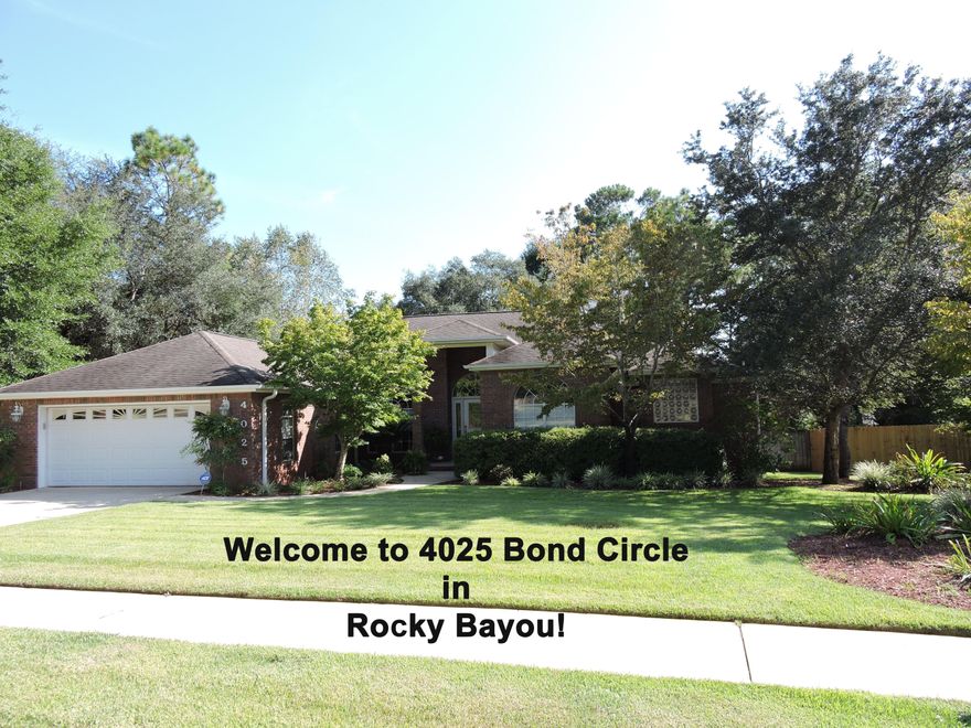 GORGEOUS updated home in centrally located Rocky Bayou Country Club Estates on a highly sought after, no through traffic street with underground utilities & sidewalks...Great place to take an evening stroll or bike ride. Great room w/new hardwood flooring, built-in shelving, & a great view of the back yard. Kitchen w/new high end granite counters & beautiful glass tiled backsplash. Formal dining & breakfast areas. Large Master Suite w/a sizable bedroom, walk in closet, double vanities, jetted tub, & separate shower. Fourth bedroom (or office) is adjacent to master side of home. There are 2 more bedrooms on the opposite side of the home separated by a freshly updated bath with high end granite counters. Lushly landscaped back yard is private & perfect for entertaining w/privacy fence.