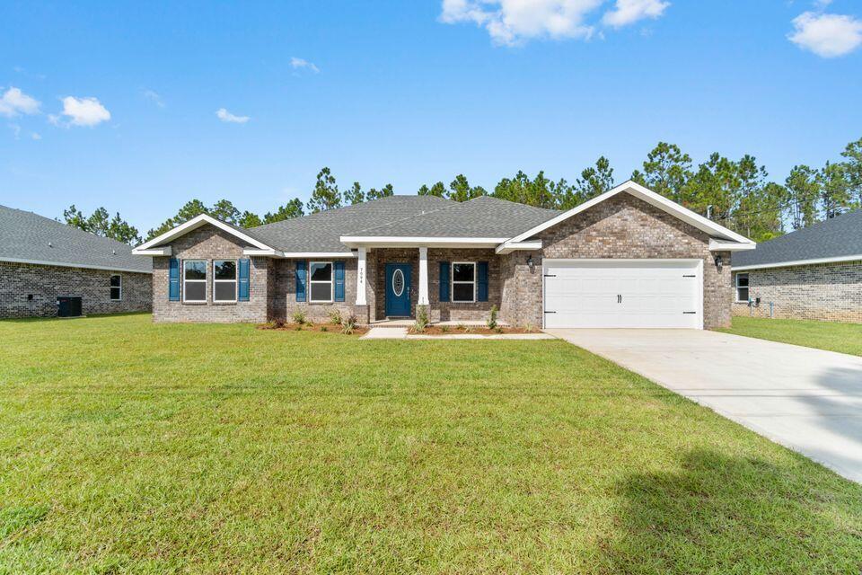 Under Construction, completion estimate 7/22/22. This 5 bedroom 3 bath split home is located in the beautiful city of Pace.  You will love this wide-open floor plan! Elegant kitchen space with a large granite island, shaker cabinets & stainless steel stove, microwave & dishwasher. LVP flooring throughout main living areas. Spacious master & master bath includes an incredible stand-up shower with dual shower heads, separate garden tub, double vanity & double walk-in closet. Exterior features include a large covered patio & so much more! Your Search Is Over, Come Home To Quality. Note: Photo is of a Similar Home