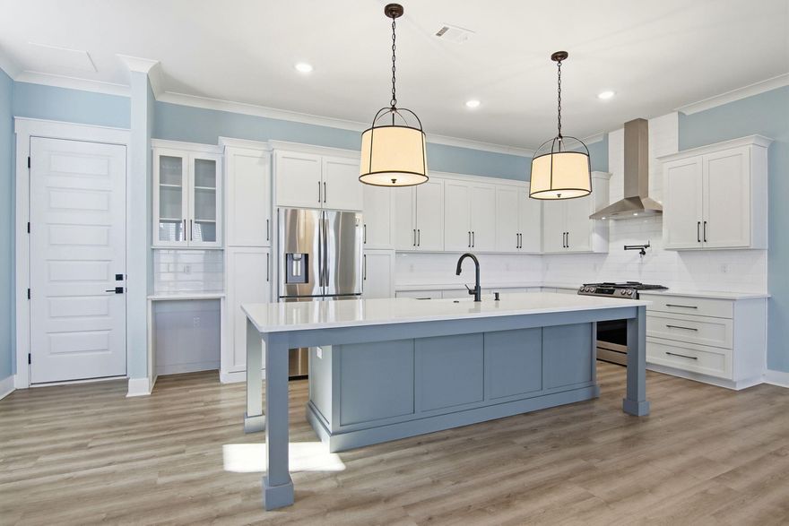 SELLERS MOTIVATED! Classic appointments, exquisite decorating, incredible upgrades & a soothing color palette make this your choice for the finest in Coastal Living! Highlights include:  Craftsman-style construction...6-Panel, solid-wood, interior doors...luxury vinyl plank flooring...barn door feature...fabulous IKEA custom closet organizers...custom gas fireplace...Jack & Jill bath...pocket doors, contemporary metal bannister, upstairs landing could double as an office, study room or home-school classroom..beautiful Silestone countertops throughout!  Sellers' faves: trips to Johnson Beach-minutes away...Relaxing on the Community Boat Dock...Innerarity Point Playground Park...Community Pool recreation area with Pickleball Courts, Outdoor Chess & Checkers boards & a Bocci Ball court!