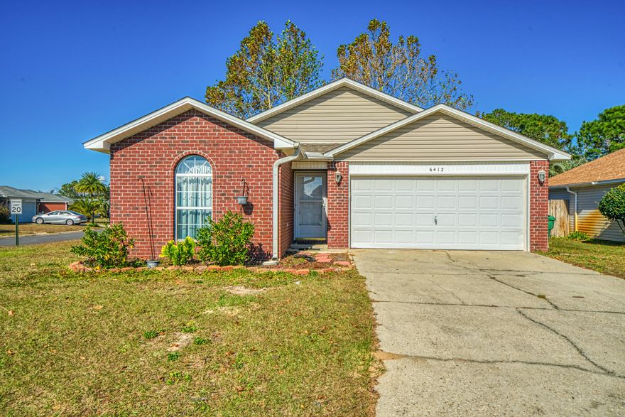 This home features an open floor plan with vaulted ceilings in the living room. The kitchen has tons of cabinet space and breakfast nook. The master bath room has two walk in closets and a separate garden tub and shower. Lot features a fully fenced in yard.