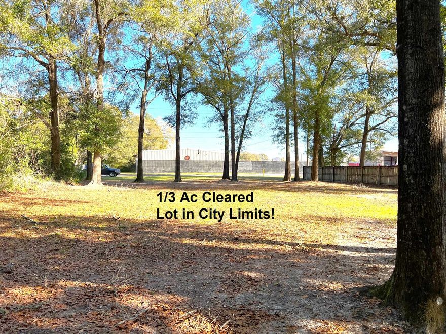 Prime location on this 1/3 acre lot in city limits! This lot is cleared and ready to build on, with several nice oaks left in place! Public water and sewer is available (tap fee would need to be paid). Won't last long!