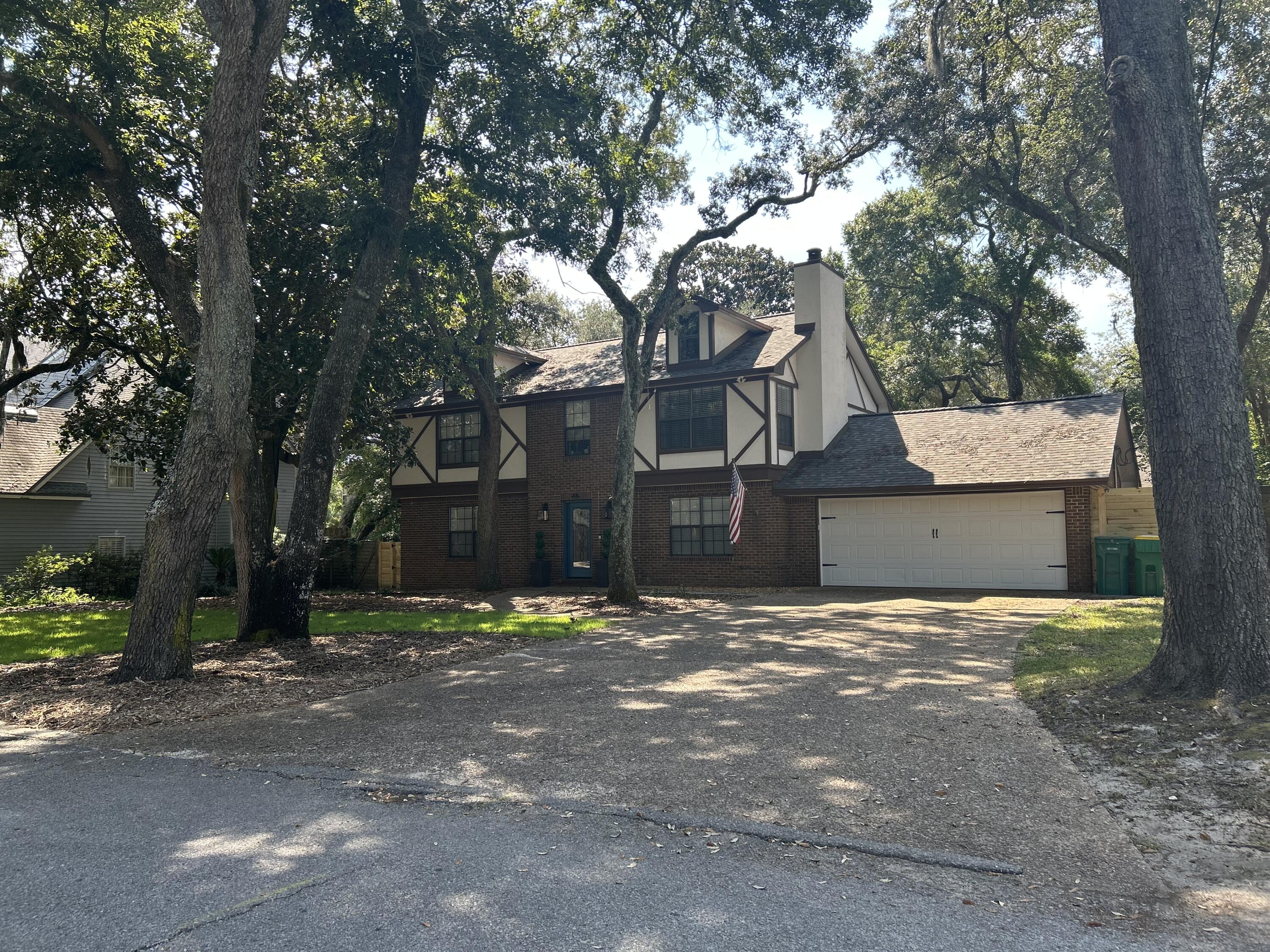 This amazing Tudor home is tucked back away under the trees on a dead end street. Water easement access for kayaking and paddle-boarding bring another layer of awesomeness to this home. With a newer renovated kitchen, decent size bedrooms - speaking of bedrooms - did you say you needed 4 bedrooms?