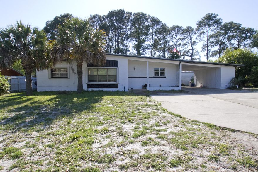 Excellent starter home or investment property. The home features block construction, large back yard which is partially fenced. The homes exterior was just repainted in 2013. The open carport can be converted to garage. This home is located in the heart of Fort Walton Beach! Close to shopping, dining, and the beautiful white sandy beaches of the Gulf!!!