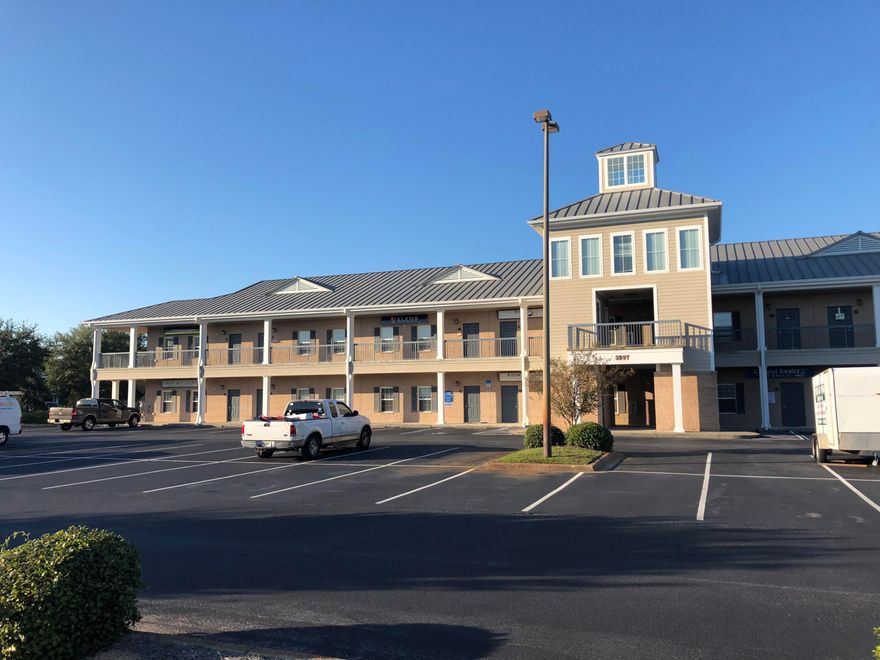 Unit has five offices, reception area, break room and bathroom. Reception and hallway just updated with vinyl flooring. Ample parking.