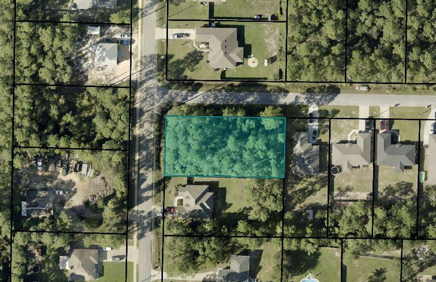 Come build your dream home on this large .46 acre corner lot in Navarre. No HOA. No improvements have been made. Raw uncleared land. Located just 3 miles to beautiful Navarre Beach and 13 miles to Hurlburt Field. 1 mile to Publix and other shopping and dining including the new entertainment complex to be built.