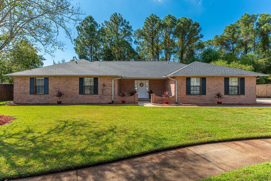 Beautiful brick home w/ new roof. 4 Bedrooms, 3 Full Baths, Large Interior Rooms, Screened Porch, Side-Entry 2-Car Garage and an In-Ground Pool! Located on a quiet cul-de-sac in the heart of FWB, this home is conveniently close to Hurlburt Field, Eglin AFB, Beaches and Fort Walton Beach shopping! Pride of Ownership shows... The front courtyard welcomes you to this lovely home with many wonderful features which include: Great Room with Cathedral Ceilings, Brick Fireplace, Large Eat-In Kitchen with plenty of counter space, Breakfast Bar & Breakfast room. In addition to the eat-in Kitchen area, there is a very large, tiled formal dining room. The Master Bedroom Is approx. 16x16 and has a welcoming Master Bath with double vanities, a Huge walk-in closet, garden tub