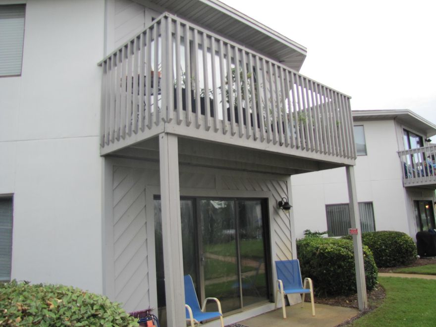 Ground floor unit with unique octagon floor plan.  Open spacious feel.  New kitchen cabinets, new stainless appliances, nice backsplash.  AC replaced in 2020, water heater replaced in 2022.  Hall bath updated, new toilets and ceiling fans.  Two community pools, one of them heated.  Walk to beach is 2 1/2 blocks.  Kitchen and baths have tile flooring, laminate flooring everywhere else.  Sold mostly furnished.  Buyer should verify all measurements.