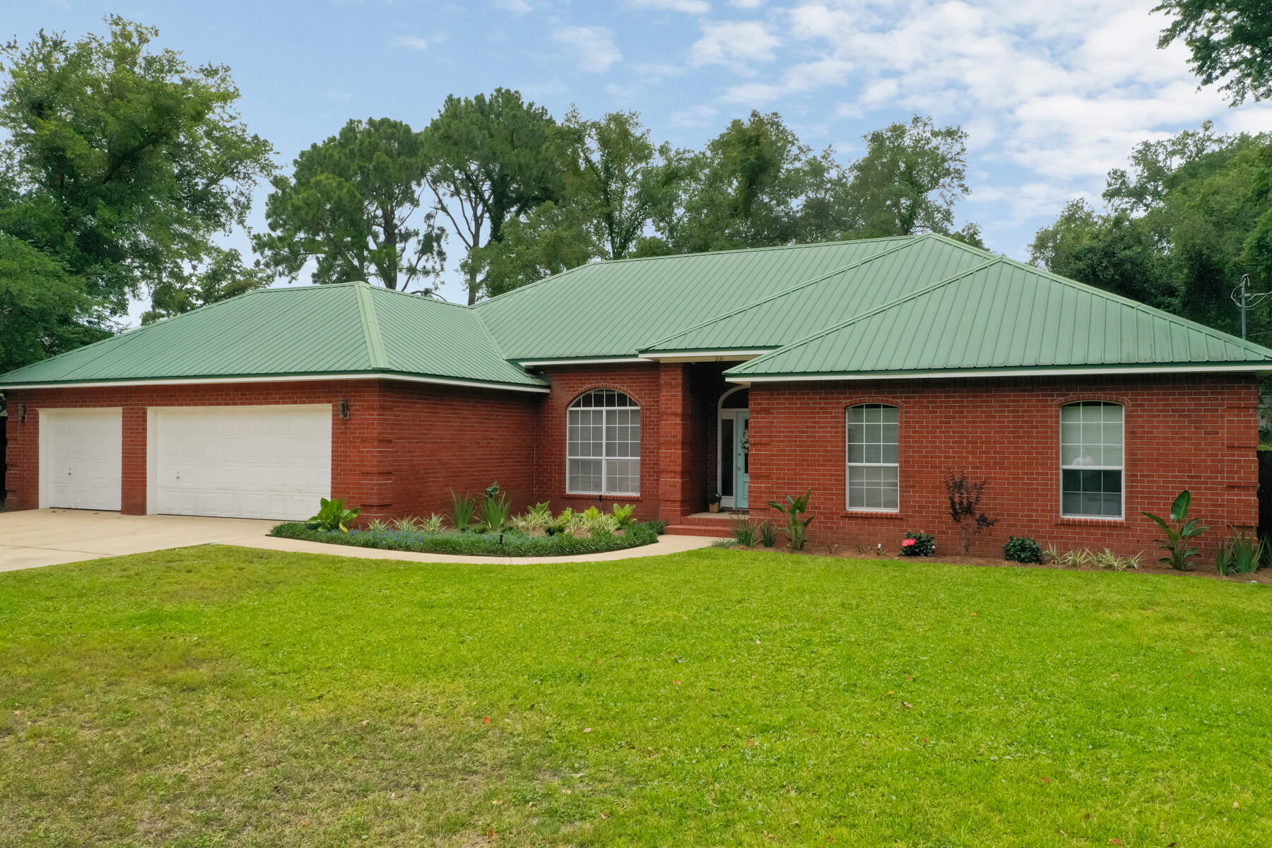 If you are looking for a spacious family home offering great outdoor space, an amazing location, a 3 car garage, and in a cute neighborhood overlooking Cinco Bayou... you have found the perfect home. This spacious home as a great floorplan offering 4 bedrooms, 2 full baths, 1 half bath, a large kitchen, and a bonus room. As you enter the home, you walk into an open foyer with high ceilings and a large living room, showcasing tall vaulted ceilings. Off the living room you further have an enclosed patio to bring the outdoors in. Conveniently located less than 20 minutes to both bases, the beach on Okaloosa Island and is less than a mile from the boat ramp to enjoy the great outdoors by water. You are also conveniently located to Publix Grocery, multiple restaurants, and much more!