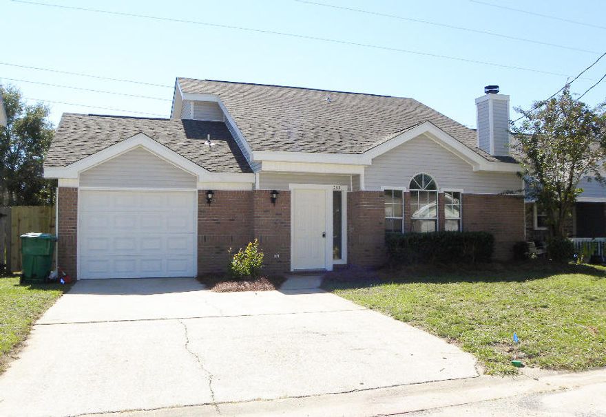 This home is like new with many upgrades throughout and is minutes from Hurlburt Field! With a split-bedroom floor plan you'll enjoy a spacious master suite on the 1st floor with double closets and French doors leading to the back patio. The living room boasts cathedral ceilings, new laminate wood flooring and a corner fireplace. In the eat-in kitchen there is an abundance of cabinet and counter space with another set of French doors leading to the back patio and large back yard. All bedrooms have new flooring and paint as well as new paint throughout the entire home. The upstairs bathroom has a new vanity and fixtures. Have piece of mind in your new home with this brand new 30 year dimensional shingle roof, new windows and complimentary one year home warranty.