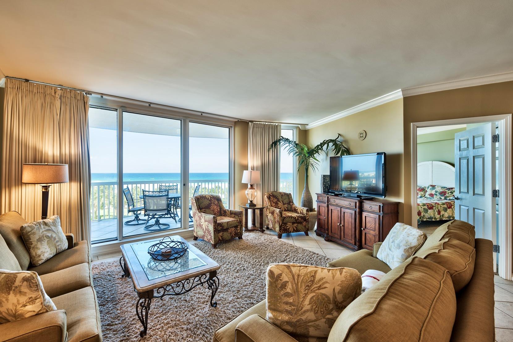 Dreaming of beachfront luxury at a prime gated community in Destin? St. Maarten Unit 403 is a phenomenal Gulf front 3-bedroom, 3-bath condominium with a private elevator and beautiful finishes throughout. Enjoy Gulf views from nearly every room and an expansive private terrace totaling 231 sq. ft. (9' x 33'). This is a great place to relax and entertain with the open floor plan and wet bar. Not one but two Gulf front bedrooms with balcony access, which is a rare treat for condos. The large floor to ceiling glass windows & doors truly maximize the Gulf views and the high ceilings and crown molding throughout creates a grand atmosphere. The kitchen offers beautiful granite countertops & breakfast bar, stainless steel appliances, custom finished cabinets and a glass mosaic tiled backsplash.