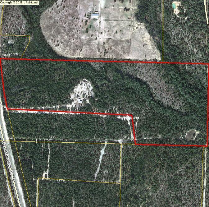 Over 800' on Hwy 331, zoning is estate residential. There is a creek that runs through towards the back of the property. The double wide trailer does not convey. Trailer could possibly be sold separately. Cannot access property without listing broker. Must call listing broker for showing.