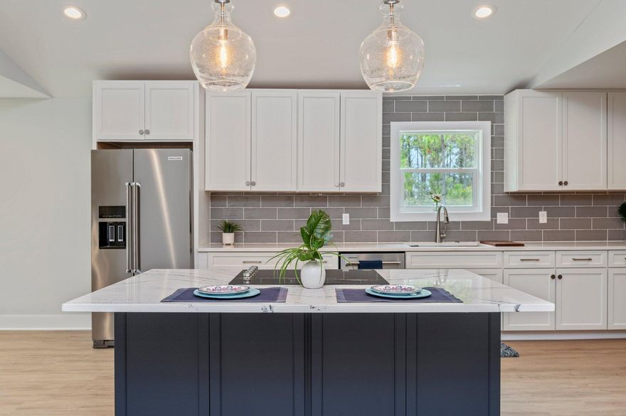 LAKEFRONT Home Driftwood Estates! Better than New.. This Home has Undergone a MAJOR Renovation in the Past 2 Years!  Renovations Include:  2021 Dimensional Shingle Roof / New Copper Wiring / New Pex Plumbing / Rheem AC & Heat / 2022 KitchenAid Stainless Steel Appliances / Cambria Quartz Kitchen Island / Yorktowne Solid Wood Soft Close Cabinetry / Quartz Countertops / Luxury Vinyl Plank Flooring  /  Stainless Steel Farm Sink / Recessed Lighting / Custom Light Fixtures and Celing Fans / Solid Core Doors & Coastal Trim Package / Jeldwen Impact Windows / Custom Tile Shower & Bath Surround / Lighted & Defrosting Mirrors in Baths / Electric Fireplace / Shiplap Mantel & Mudroom Bench / Custom Tile Backsplashes / 2022 Sod & Landscaping / Exterior & Interior Paint / Wall Mount Media Outlets. Other