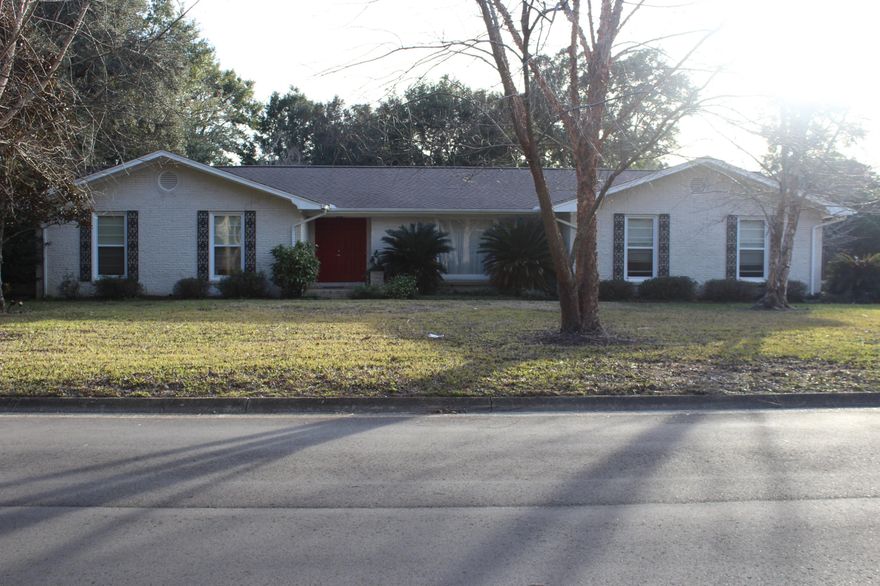 Prestigious Lavallet Subdivsion with community park.This home is in the highly sought after Cordova Park Elementary district . This residence offers a large level lush back yard with fully fenced yard for privacy, entertainment, coy pond. This one level home also offers formal living room, formal dining, kitchen open to the family room with wood burning fireplace. The three bedrooms offer oversized closets, two of which are walk-in. The master bath has an upgraded tile shower with glass doors. Home comes with a 1 year Home Warranty. Two car side entry garage with doorway leading to family room. This all brick home is close to Interstate I-10 for easy commutes, restaurants, shopping, and Pensacola international Airport