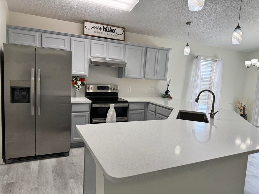 No HOA, completely remodeled home in South Crestview! *Seller to pay $7,500 toward closing costs!* Don't miss this brick home, fenced yard, on a corner lot with an easy commute to/from bases. The covered front entry welcomes you into this light & bright open split bedroom floorplan with beautiful LVP flooring & quartz countertops throughout. The master bath packs in so many nice features - from the dual vanity, separate shower & garden tub to a separate water closet & huge walk-in closet. The dining area has a sliding glass door leading to the covered back porch & I can just picture the new owner sipping coffee or grilling steaks while watching the kids or dogs play in the privacy-fenced back yard! Metal roof installed 2014 & HVAC replaced in 2021. Call today & move in BEFORE CHRISTIMAS!