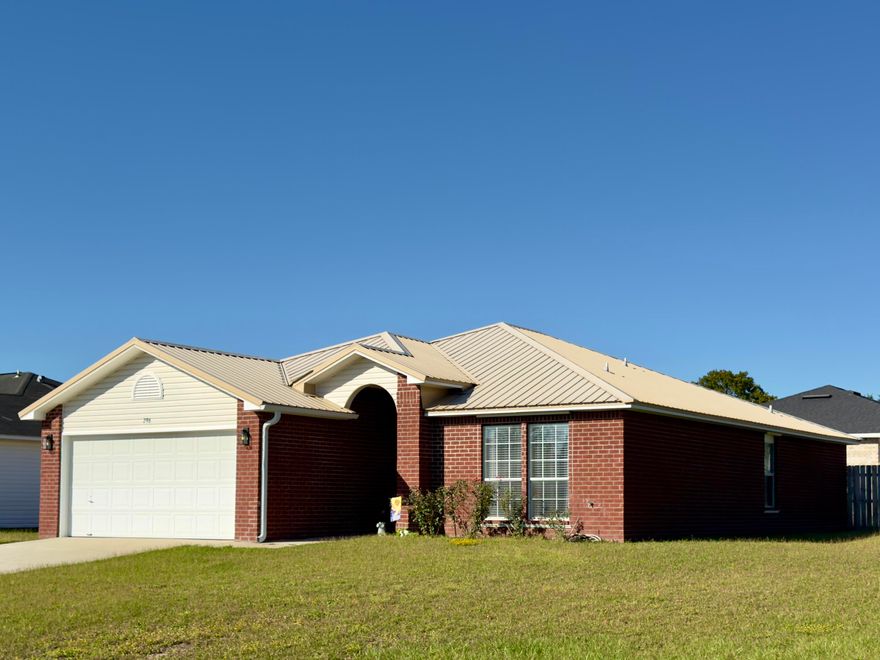 Perfect home, perfect location, ready for it's new family. Don't miss this beautifully remodeled, freshly painted, home on a corner lot in south Crestview - 3 bed, 2 bath, 2-car garage brick home, super floorplan, LVP flooring and quartz countertops throughout. The covered front entry and foyer welcome you into this light and bright, open, split bedroom floorplan. The master bath packs in so many features from the dual vanity, separate shower and garden tub to the water closet and the closet is huge! The dining area leads to a sliding glass door and I can already see you drinking coffee on the covered back porch or grilling steaks in the privacy-fenced back yard! Metal roof, 2014 and HVAC replaced in 2021. **$10K Seller CREDIT**! Call your favorite agent today to schedule your showing!