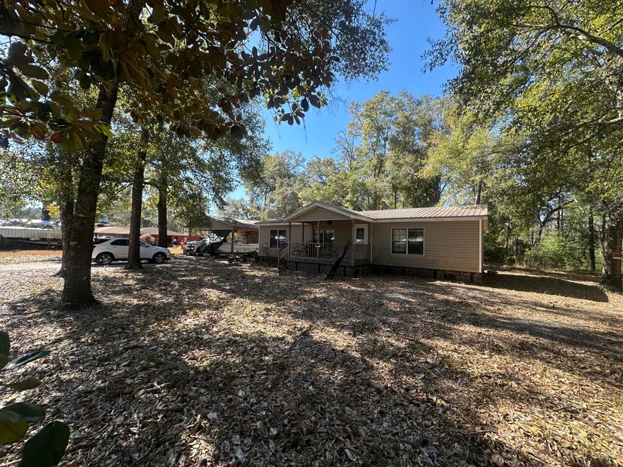 LOCATION! LOCATION! LOCATION! Are you an investor or builder looking for your next project? If so, this might be just what you are looking for. The property is just over a mile from the Choctawhatchee Bay, and minutes from downtown Freeport and the world's most beautiful beaches. The property also features a water view of one of the many canals leading to the bay and is near the dead end of the road. The home is a 3 /2 manufactured home that can be removed or fixed up to be a great investment or forever home. The house does need work, but it is hard to find homes in this area at that price. A nice shed/carport is also located on the property. So if your looking to get close to the beaches and not ready to pay that beach price, maybe this fixer up will be just what you are looking for!