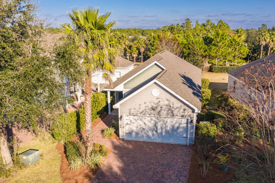 Turtle Cove is nestled just off HWY 98 on the west end of Panama City Beach This charming 3 bedroom 2 bath home offers an open floor plan with a 2 car garage. The spacious family room features vaulted ceilings and is open to the kitchen for easy entertaining. The Kitchen is equipped with stainless appliances, granite countertops, custom island, breakfast bar, crown molding, and pantry. Off the kitchen, enjoy your early morning coffee or evenings from your screened in back patio. The Master suite has an elegant tray ceiling with walk in closet. The adjoining ensuite bath features a double sink vanity, garden tub, and separate walk-in shower. Two guest bedrooms share a full bath and there is a laundry room that leads to the garage. This beautifully landscaped community on Lake Powell, the