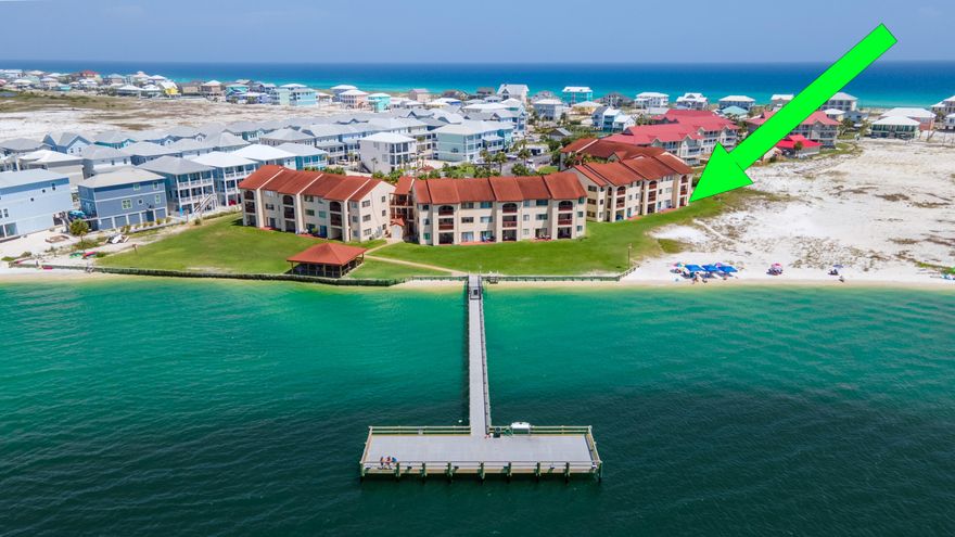 WELCOME to your piece of beach living! A TRUE one bedroom (not a studio) first floor condo. Turn key ready with for you to use for summer or investment. This unit comes fully furnished with a detailed content list. Navarre Beach is 'Florida's Most Relaxing Place' because Florida's Best Kept Secret is out! This is the place to live, play and INVEST! Amazing views of the Santa Rosa sound from your patio, swim in community pool, picnic in the pavilion area with grills and tables. DOCK and boat parking making this a fisherman's paradise. Short term rentals allowed.