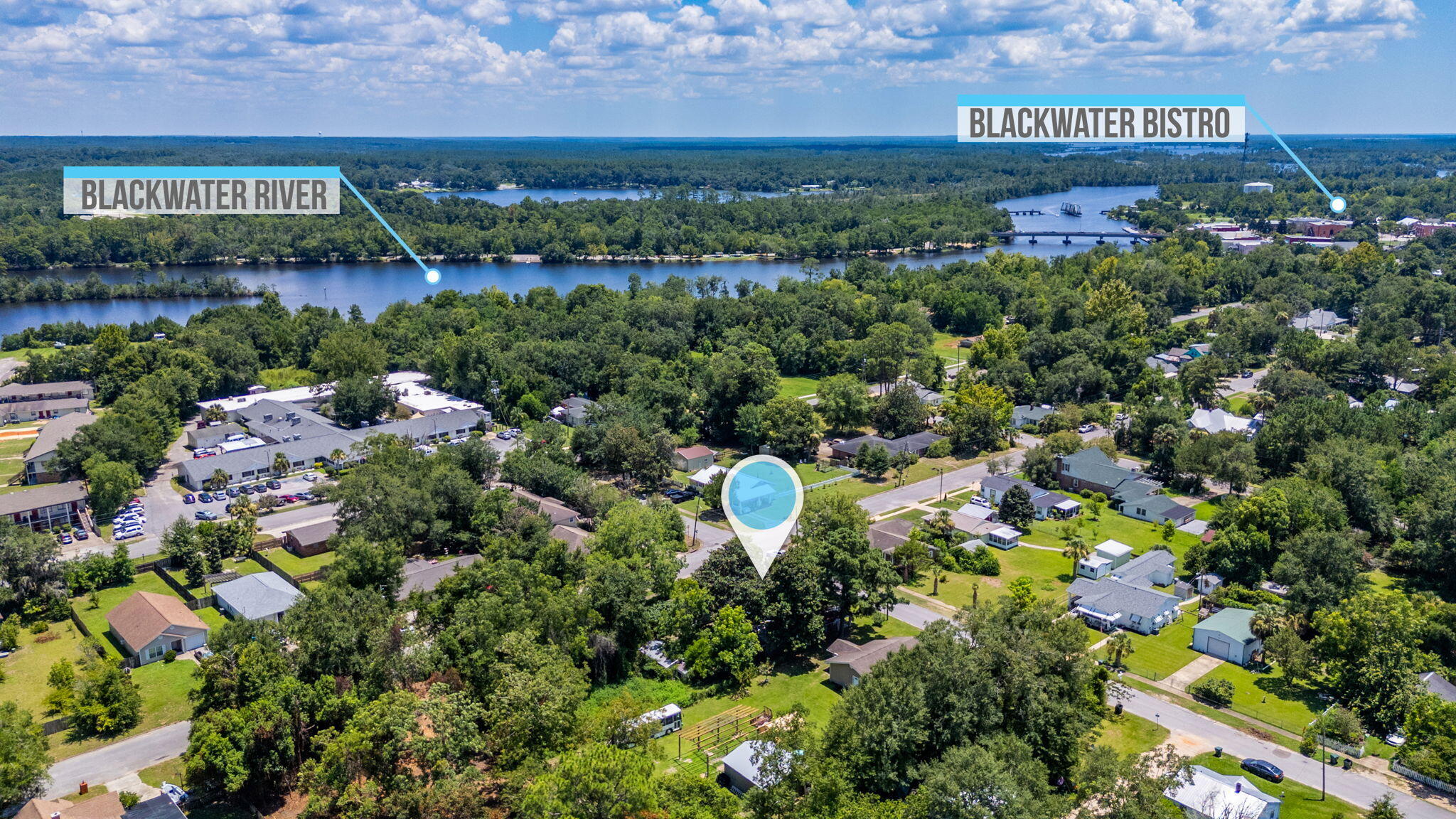 Seize the opportunity to own a piece of history with this quaint Florida cottage in the downtown area of Milton! Enjoy swimming and boating on beautiful Blackwater River with convenient access to Carpenter's Park - located less than a 1/2 mile from property. It's the perfect spot for your future investment/AIRBNB or enjoy this as your own private residence. The home boasts 3 bedrooms and 2 bedrooms, open floor plan for the common areas and has the original hardwood flooring in some areas of the home that could refinished by the new owner. Large corner lot w/ nice hardwoods, fruit trees and several outbuildings. So much potential here and a chance to be near an up and coming area that already has proven itself to be a place people love to gather! Lots of amazing restaurants to dine including some local and personal favorites as Blackwater Bistro and Boomerang Pizza! PROPERTY TO BE SOLD IN AS IS CONDITION! Come check it out and make it your own!