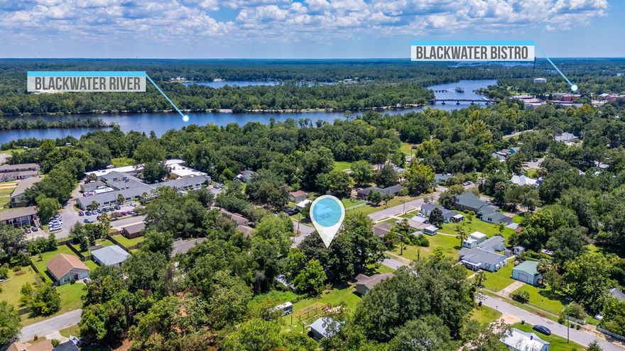 Seize the opportunity to own a piece of history with this quaint Florida cottage in the downtown area of Milton! Enjoy swimming and boating on beautiful Blackwater River with convenient access to Carpenter's Park - located less than a 1/2 mile from property. It's the perfect spot for your future investment/AIRBNB or enjoy this as your own private residence. The home boasts 3 bedrooms and 2 bedrooms, open floor plan for the common areas and has the original hardwood flooring in some areas of the home that could refinished by the new owner. Large corner lot w/ nice hardwoods, fruit trees and several outbuildings. So much potential here and a chance to be near an up and coming area that already has proven itself to be a place people love to gather! Lots of amazing restaurants to dine including some local and personal favorites as Blackwater Bistro and Boomerang Pizza! PROPERTY TO BE SOLD IN AS IS CONDITION! Come check it out and make it your own! 