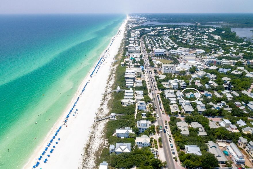 Located just 3 lots in from 30A across from the sugary white sand, Salty Dog has a laid-back, beach lifestyle. The cottage blends cheerful colors with relaxed accommodations. The front porch wraps around the south side of the cottage with plenty of room for outside dining. The open plan of the first floor allows for plenty of space to unwind at the end of a fun-filled day on the beach. Entertain guests on the porch or move inside to admire the crisp and modern interior. A recent update to the kitchen features quartz counter tops and stainless steel appliances. From the contemporary style, breakfast bar for casual dining, to the accompanying main dining space and comfy living room, there's much to enjoy about Salty Dog. The first floor includes a king bedroom and a second bedroom with two