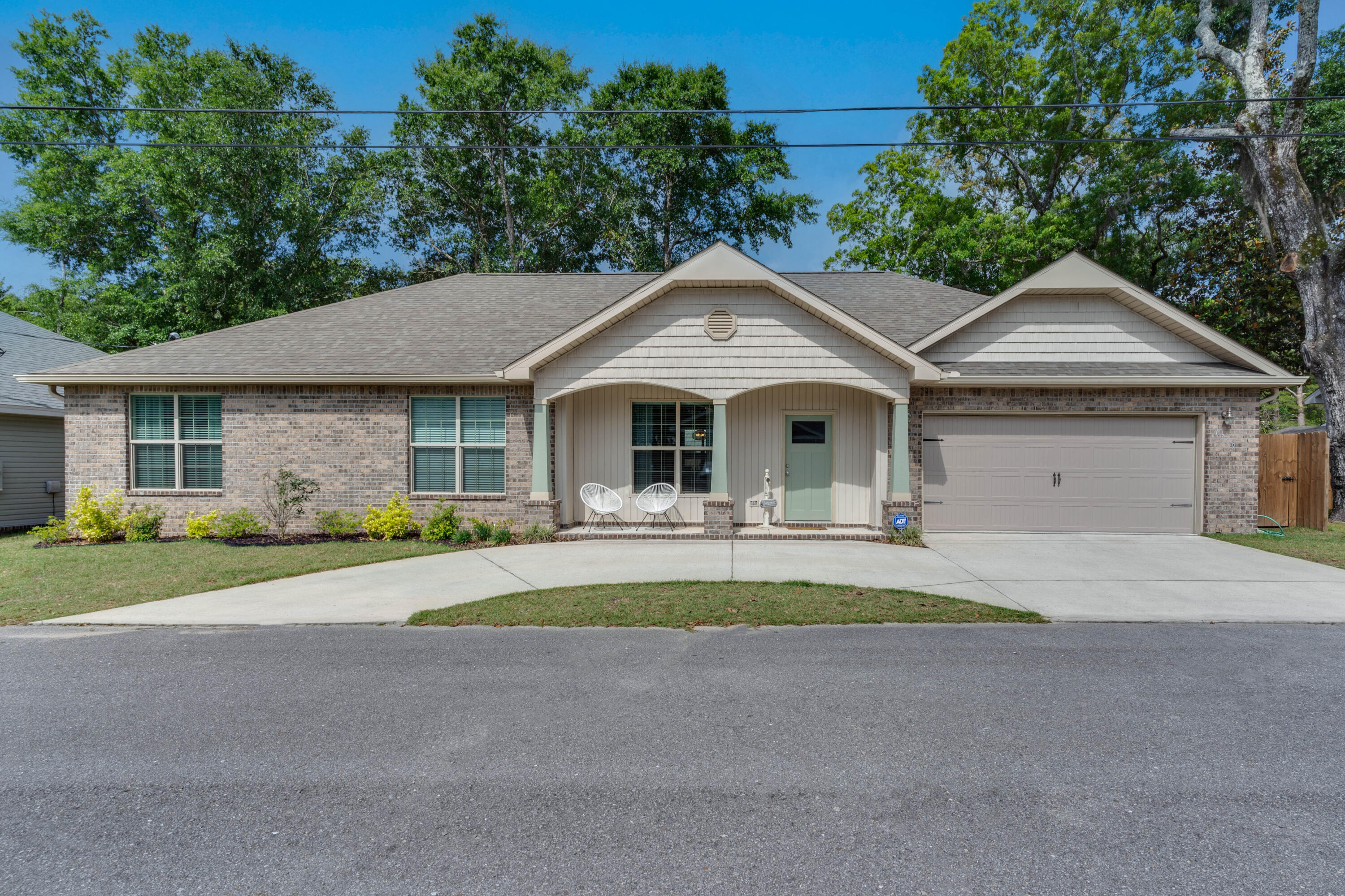 Great 2019 build! Craftsman style, single story custom home with 4 bedrooms/2 baths in the heart of Niceville. Privacy fenced back yard is great for kids and pets. This is a low maintenance lot within walking distance of Lions park and local restaurants for swimming, fishing, boating and dining. Brick and vinyl exterior. Vinyl plank modern flooring and tile with carpet in bedrooms. All wood cabinets with granite tops. Nice size laundry room. Owners installed extra storage in the garage! This home is PERFECT for a military family with kids! EXCELLENT location, schools, and street!