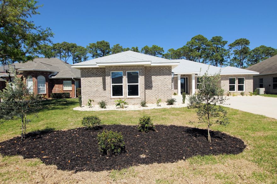 New Construction home in Gated Waterfront Community. There is a community clubhouse with a pool overlooking the intracoastal waterway that leads to a long dock great for fishing or pulling up to by boat. Very deep lot creates a lot of privacy and provides a sound barrier. This 4 bedroom, 3 bathroom home has an additional room that could be used as an office. It enjoys an open concept and affords a dining area, eat-in kitchen, breakfast bar and pantry. 3 car garage. Laundry room. Main Bedroom enjoys double vanity, 2 walk-in-closets, linen closet, tub and separate tiled shower. Tile throughout except carpet in bedrooms. Amazing covered porch to enjoy your private back yard. Photos of homes by same builder but different floorplan. Estimate completion date on or before 2/28/23