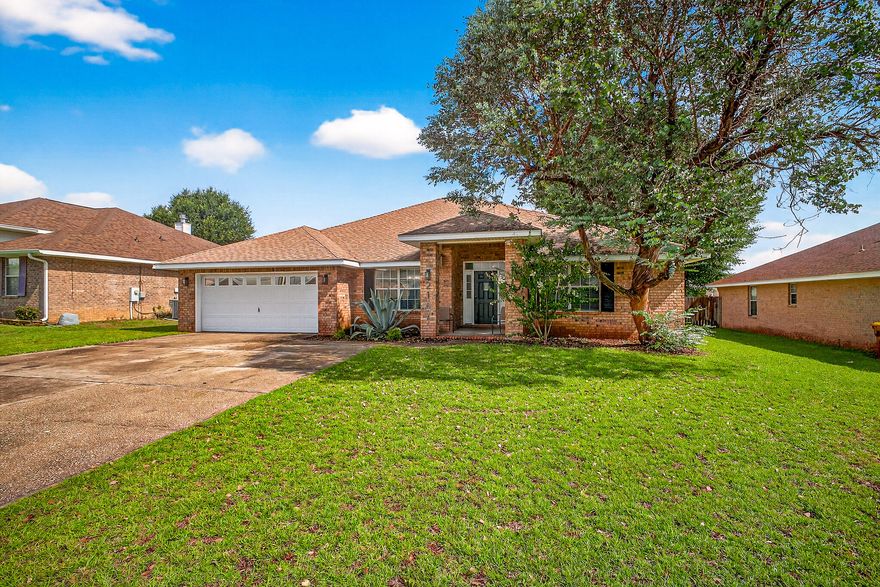 This all-brick home has a spacious layout with four bedrooms and three full bathrooms. The home offers an extended width driveway leading to a two-car garage with protective floor coating and an additional garage in the backyard. As you enter the home, you find a formal dining area and additional flex room with ample space for a den, office or playroom. The kitchen is separated by a breakfast bar that exhibits an open floor concept into the living room featuring a fireplace that adds warmth and ambiance. The master bedroom is spacious with two split-concept full bathrooms offering a separate tub and shower for his and her privacy, as well as private walk-in closets connected to each. As you step outback, you will find a large Florida room for entertaining and a nicely sized backyard that is fully fenced. Conveniently located 9 miles from Duke Field, 20 miles from Eglin AFB & 31 miles from Hurlburt Field! Don't miss out on this beautiful home, call 850-496-3593 to schedule your private showing today!