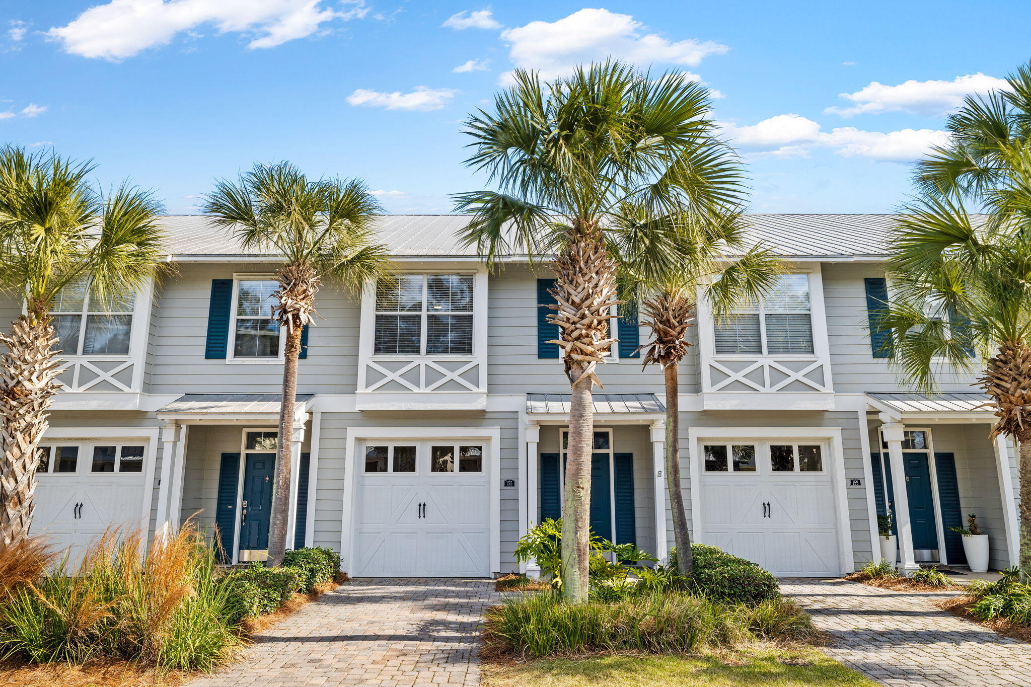 Affordable luxury awaits you in the sought-after coastal neighborhood of Eagle Bay!  This charming 3-bedroom, 2.5-bathroom townhouse boasts a prime location just five minutes from the beach and a short distance to two convenient boat launches. Recently refreshed, the home features a sleek, modern coastal interior with upgraded appliances and elegant quartz countertops.Enjoy the convenience of a one-car garage and additional parking for two compact cars. Step outside to a cozy covered patio, perfect for relaxing or entertaining guests. This townhouse offers the perfect blend of luxury and coastal living--don't miss the opportunity to make it your own!