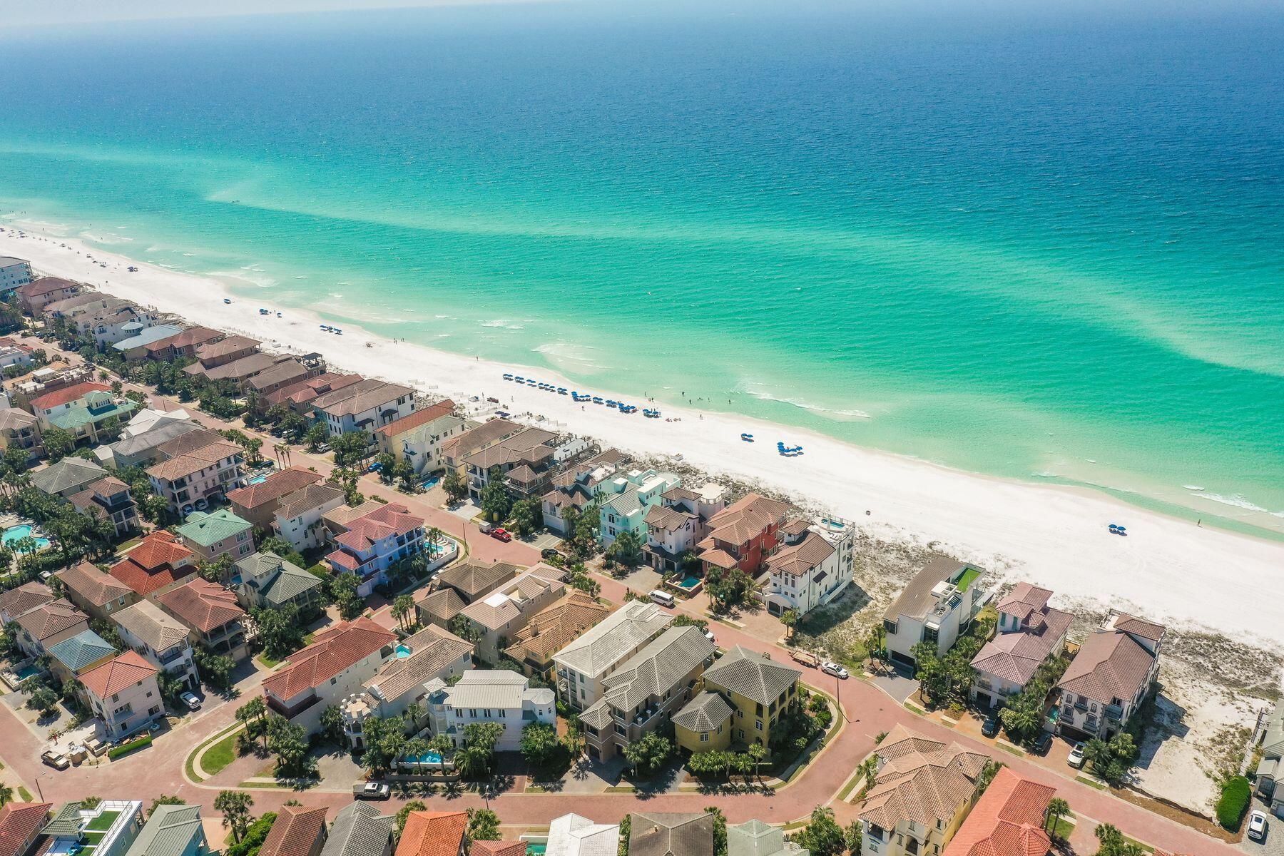 Masterfully designed and perfectly positioned for enchanting views of the Gulf of Mexico, this 4665 square foot home provides an immense amount of space for those longing for a true oasis experience footsteps from the sugar sand beaches of the Emerald Coast. Spanning across three levels and six total bedrooms, amenities abound throughout the property such as expansive living areas, a chef's inspired kitchen, oversized dining areas and multiple levels of both covered and open outdoor spaces, ideal for al fresco dining with friends and family.