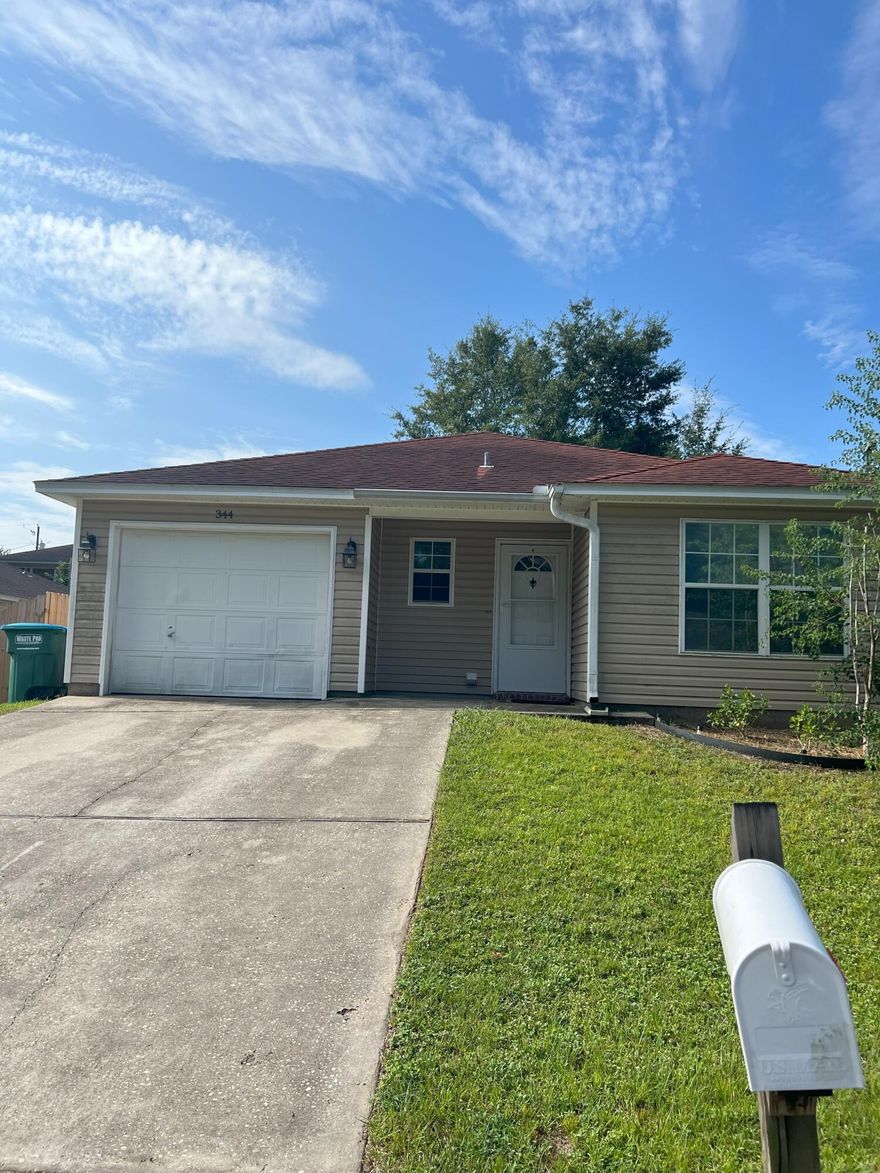 Charming 3 bed/ 2 bath Crestview home, conveniently located south of I-10 off of PJ Adams Road. This home has brand new carpet throughout and is ready for immediate occupancy. The sliding door in the dining room opens to a covered patio with a private fenced backyard. The galley style kitchen is complete with stove, fridge, dishwasher, garbage disposal and built-in microwave. The one-car garage has a laundry alcove with full sized washer and dryer included. The large master bathroom includes his and hers sinks and walk-in closet. One year lease, application fee, and security deposit required. No smoking. Pets will be considered.
