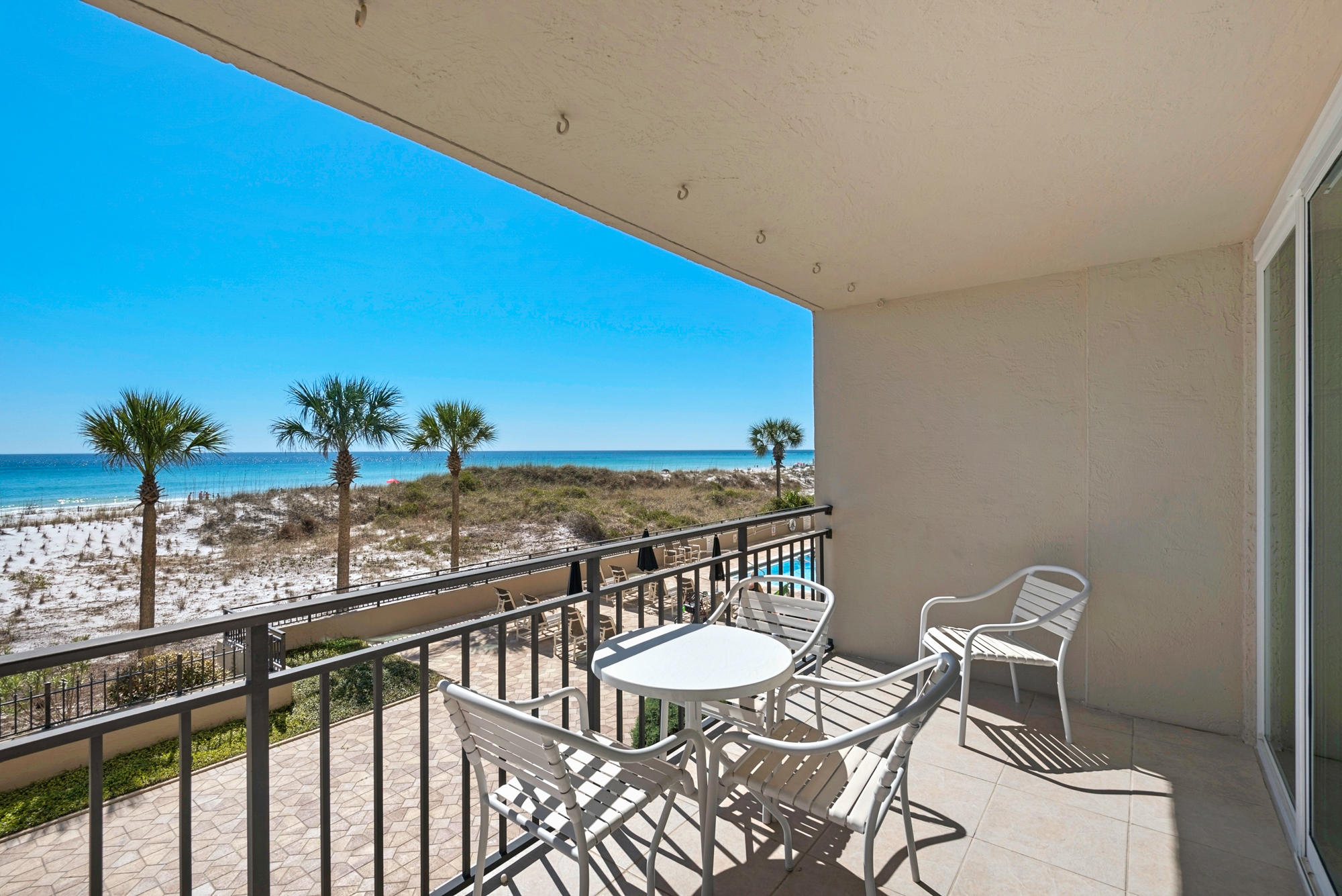 WELCOME TO THE BREAKERS on Okaloosa Island! EXCEPTIONAL OPPORTUNITY! One of the most sought-after vacation spots on Okaloosa Island. This 1-BR directly Gulf-front condo is fully furnished and rental ready, or makes a perfect second home/vacation spot, or full-time residence! Views of the sparking Emerald Green Gulf of Mexico from your oversized balcony. Beach living made easy. Excellent rental history! New HVAC and water heater installed in 2018. Kitchen features wood cabinetry, granite countertops, and smooth-top stove. The unit features a large Master Bedroom with a King size bed, Master Bath, and a separate Half-Bath. Stackable washer and dryer. Additional Storage Closet also on 2nd Floor! The Breakers amenities include onsite check-in and reservations, security, fitness center, commun
