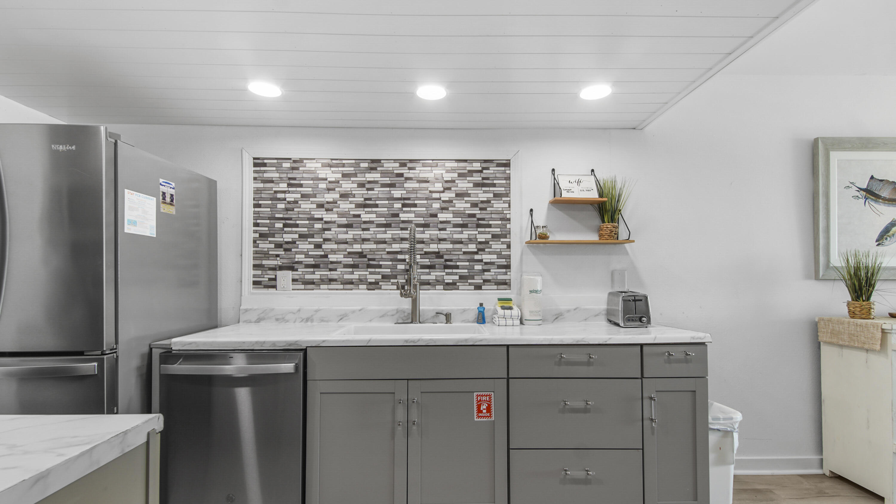 COMPLETELY RENOVATED INTERIOR & EXTERIOR - STUNNING, 2BR/3BA GULF FRONT TOWNHOME WITH NO HOA FEE ON WEST END OF PCB. UPGRADES: All stainless appliances (microwave, double door refrigerator, range & dishwasher), Cabinets, hardware, countertops, backsplash, sink, faucets, garbage disposal, & stackable washer/dryer. (GE electric 3.8-cu ft washer and 5.9-cu ft dryer). All furniture, artwork & decor. Coffee bar. All exterior siding, (front & back of unit) & all exterior painted. Removed all 1st floor decking, installed new deck and added water proofing material, added sand deck, replaced living room level deck and upstairs bedroom balcony decking with new wood & painted all. Installed engineered wood plank. 2nd floor. HVAC, Full replacement of all metal door frames & sliding glass doors upstairs & downstairs. Front door metal overhead, decking & ring camera. Replaced full electrical breaker box panel and breakers. Removed all interior flooring and installed engineered wood plank. All light fixtures, ceiling fans, & lights. All bathroom vanities, sinks, countertops, showers & hardware. Redid ceilings, added shiplap on kitchen ceiling and master suite, interior fully painted. Step out your back door to your own private deck and into the sugary white sandy beaches and emerald coastline. Enjoy the incredible sunset views from Gulf front living area, kitchen & master suite! By Pier Park shopping, entertainment and restaurants. Great for primary, second home or short-term vacation rental. There are only 9 townhomes at Seagull Beach. They rarely come on the market. Don't miss out on this one!