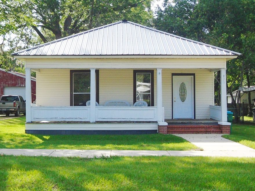 LOCATED JUST ONE BLOCK FROM LAKE JACKSON THIS BEAUTIFUL HOME OFFERS PLENTY OF SPACE AND TONS OF EXTRAS. HOME WELCOMES YOU WITH A GREAT COVERED FRONT PORCH PERFECT FOR RELAXING, A LARGE LIVING AND DINING ROOM AND 2 AMPLE SIZE BEDROOMS ALONG WITH A GREAT SIZE KITCHEN WITH ALL THE APPLIANCES PLUS A AMAZING SIXE BATHROOM! HOME HAS A FENCED BACK YARD AND INCLUDES A 700 SQFT BLOCK STORAGE BUILDING AND WORKSHOP - PERFECT PLACE TO STORE ALL YOUR WATER TOYS FOR THE LAKE OR TO WORK ON YOUR PROJECTS! HOME HAS A METAL ROOF, CENTRAL HVAC, AND IS MOVE IN READY!