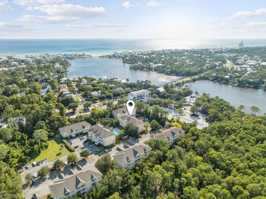 Set in Heron's Watch, a gated low-density community tucked just off 30A in Seagrove, this two-bedroom, two-bath condo offers one of the most approachable opportunities to live or invest near the Gulf. From its balcony, you look out over the pool, yet you're only steps from Eastern Lake and a short ride to the beach; a combination that's rare at this price point.The prior owner's full-scale renovation, completed about six years ago, refreshed the residence down to the concrete slab with hardwood floors, custom kitchen cabinetry and bar, updated appliances, modern light fixtures, a jetted soaking tub, glass shower door, and a new HVAC system. An open-concept main living area keeps the kitchen, dining, and gathering spaces connected, making it practical for both use and rental guests. Unlike many condos built purely for vacation turnover, Heron's Watch appeals to both investors and locals looking for a central yet quieter spot along 30A. Owners enjoy dedicated kayak and paddleboard access to Eastern Lake, which connects directly to the Gulf, plus quick access in every direction: Seaside to the west, Alys and Rosemary to the east, and Point Washington State Forest just beyond the back gate.

Heron's Watch's gated entry, pool, and lake access pair convenience with a tucked-away feel that's hard to find this close to the beach. Whether you're searching for a personal retreat or a proven rental property, this condo delivers the sought-after 30A lifestyle, without the price tag that usually comes with it.