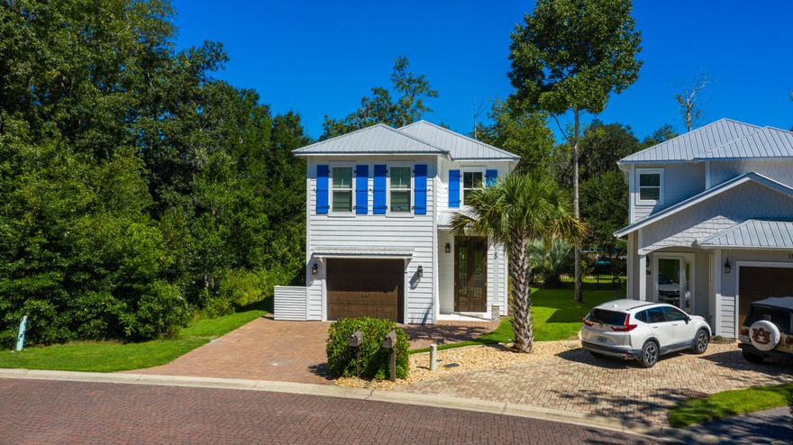 Perfectly perched on a secluded lot and surrounded by stunning water views, this  custom build is a delightful waterfront escape. Highlighted by a variety of luxurious finishes, this property features high ceilings, an array of natural light, warm toned wood flooring, and an eclectic compilation of soft colors that together offer both the beauty and tranquility of this humble abode. The luxury continues in the centrally located gourmet kitchen that boasts granite countertops, WOLF gas range, WOLF oven, SubZero refrigerator, and SubZero ice maker all facing the majestic island that ties it together. An additional 4 spacious and airy bedrooms accompany this property, the grandest of all being the elegant master with the equally gorgeous en-suite complete with walk-in shower, double vanity, and over sized walk-in closet. This house is a gift that keeps giving even as you walk outside to its screened in Florida room just off the back; a dynamic space with a array of entertainment options which is enhanced by the surround sound throughout the home's interior and exterior. This gem of a home is surrounded by Florida indigenous greenery and foliage, only adding to the peace provided by this amazing Sacred Oaks sanctuary. 

Sacred Oaks is positioned minutes from Sacred Heart Hospital, Top-Rated Schools, shopping, dining for all occasions, entertainment, Sandestin Golf and Beach Resort and Grand Boulevard and the white sandy beaches of 30A.